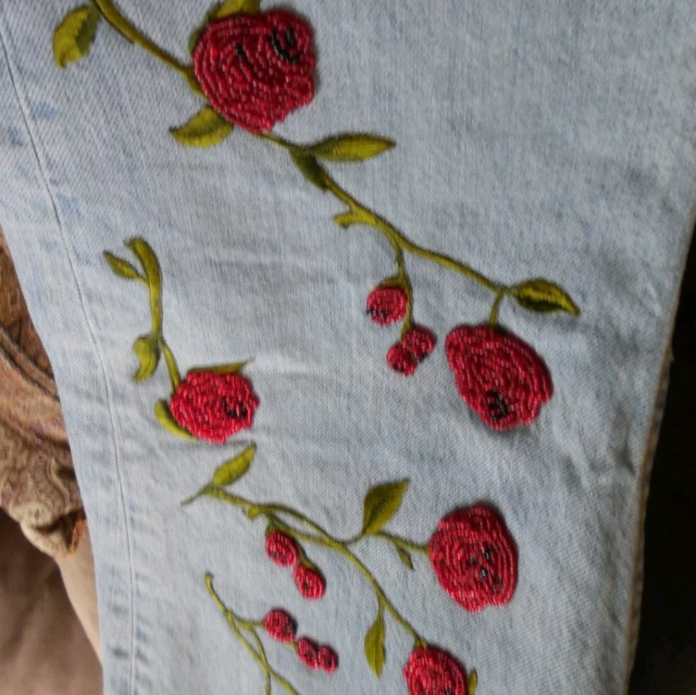 ISO Gap rose beaded boot cut jeans.  Size 12